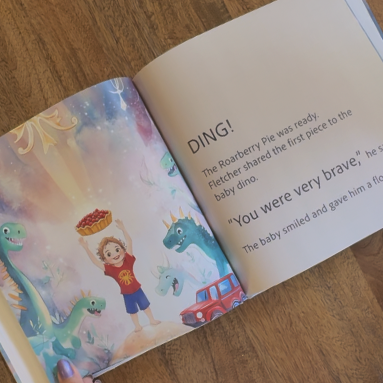 Open personalized storybook showing colorful interior pages with child character and dinosaurs in an adventure story